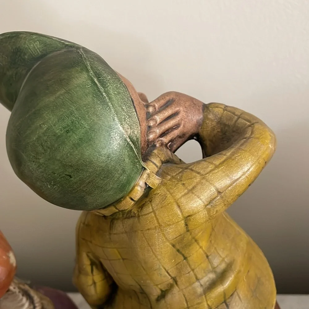 Paperboy and hobo ceramic figurines